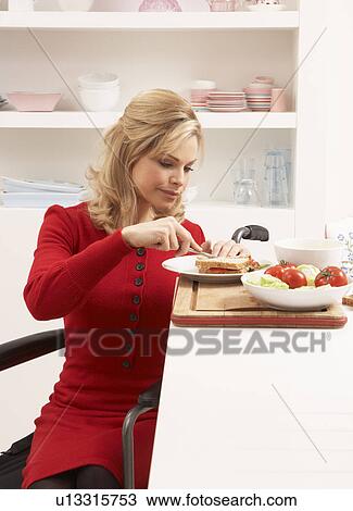 Disabled Woman Making Sandwich In Kitchen View Large Photo Image Stock Image - Disabled Woman Making Sandwich In Kitchen. Fotosearch