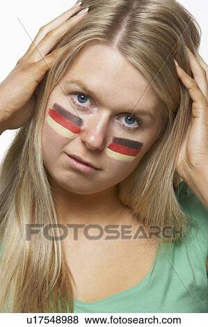 Disappointed Young Female Sports Fan With German Flag Painted On Face View Large Photo Image Stock Photo - Disappointed Young Female Sports Fan With German Flag Painted On Face. Fotosearch
