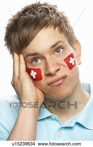 Disappointed Young Male Sports Fan With Swiss Flag Painted On Face View Large Photo Image Picture - Disappointed Young Male Sports Fan With Swiss Flag Painted On Face. Fotosearch