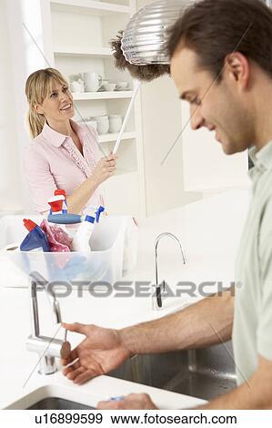 Stock Photo - Family Enjoying Meal Together At Home. Fotosearch