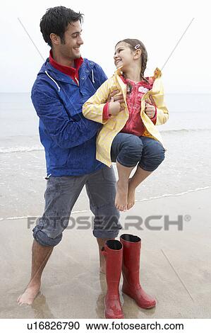 Father and daughter on beach View Large Photo Image Stock Image - Father and daughter on beach. Fotosearch