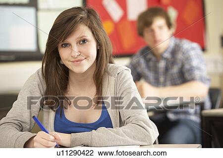 Female Teenage Student Studying In Classroom View Large Photo Image Stock Image - Female Teenage Student Studying In Classroom. Fotosearch