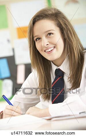 Female Teenage Student Studying In Classroom View Large Photo Image Stock Image - Female Teenage Student Studying In Classroom. Fotosearch
