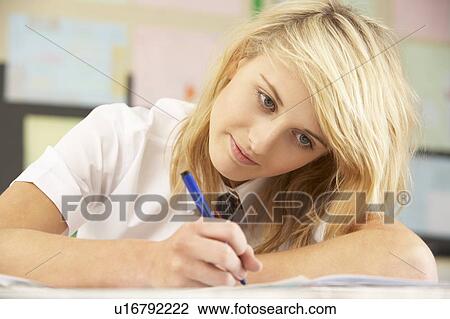 Female Teenage Student Studying In Classroom View Large Photo Image Stock Image - Female Teenage Student Studying In Classroom. Fotosearch