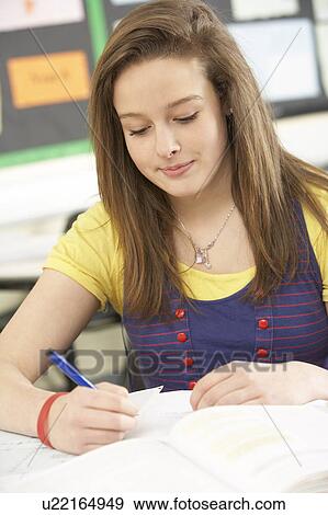 Female Teenage Student Studying In Classroom View Large Photo Image Stock Photo - Female Teenage Student Studying In Classroom. Fotosearch