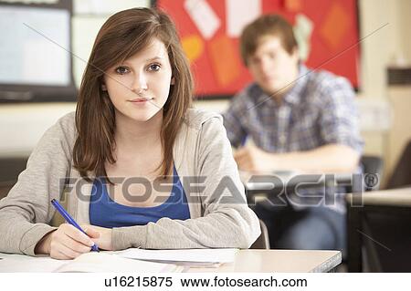Female Teenage Student Studying In Classroom View Large Photo Image Stock Photography - Female Teenage Student Studying In Classroom. Fotosearch