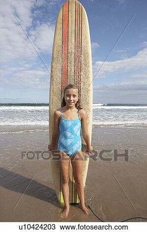 Girl with surfboard View Large Photo Image Stock Image - Girl with surfboard. Fotosearch