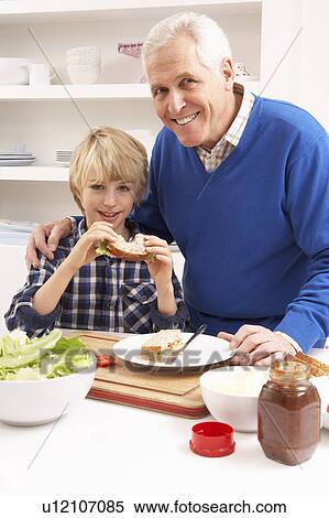 Grandfather And Grandson Making Sandwich In Kitchen View Large Photo Image Stock Photography - Grandfather And Grandson Making Sandwich In Kitchen. Fotosearch