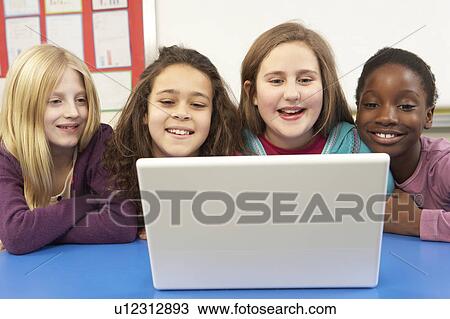 Group Of Schoolgirls In IT Class Using Computer View Large Photo Image Stock Image - Group Of Schoolgirls In IT Class Using Computer. Fotosearch