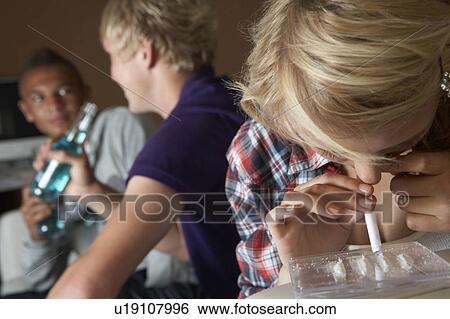 Group Of Teenage Boys And Girls Taking Drugs At Home View Large Photo Image Stock Photograph - Group Of Teenage Boys And Girls Taking Drugs At Home. Fotosearch
