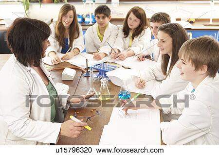 Group Of Teenage Students In Science Class With Tutor View Large Photo Image Stock Image - Group Of Teenage Students In Science Class With Tutor. Fotosearch