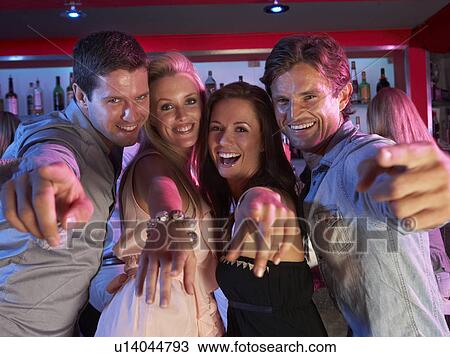Group Of Young People Having Fun In Busy Bar View Large Photo Image Stock Image - Group Of Young People Having Fun In Busy Bar. Fotosearch