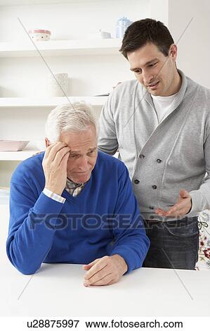 Grown Up Son Consoling Senior Parent View Large Photo Image Stock Photo - Grown Up Son Consoling Senior Parent. Fotosearch
