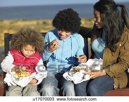 Happy family having picnic View Large Photo Image Stock Image - Happy family having picnic. Fotosearch