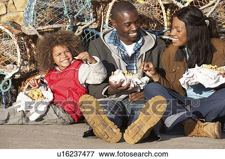 Happy family having picnic View Large Photo Image Stock Photo - Happy family having picnic. Fotosearch