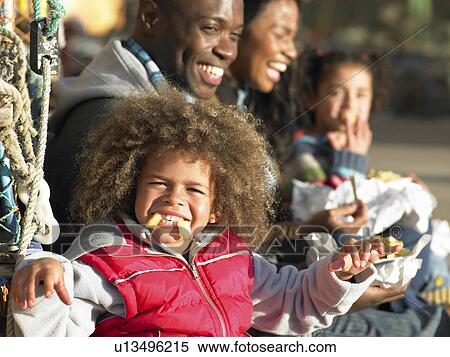 Happy family having picnic View Large Photo Image Stock Photography - Happy family having picnic. Fotosearch