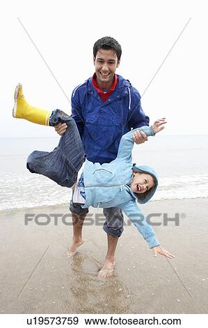 Happy father with son on beach View Large Photo Image Stock Photo - Happy father with son on beach. Fotosearch