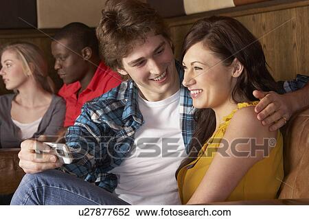 Stock Image - Happy young couple in love. Fotosearch