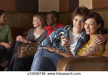 Stock Photo - Happy young couple in love. Fotosearch