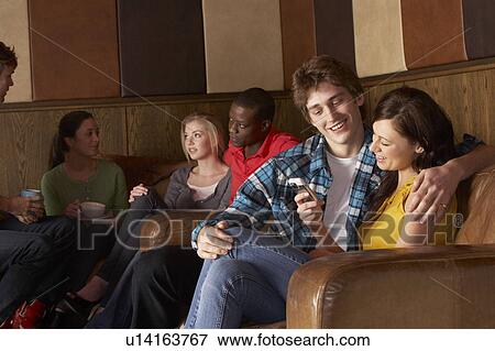 Stock Photo - Happy young couple in love. Fotosearch
