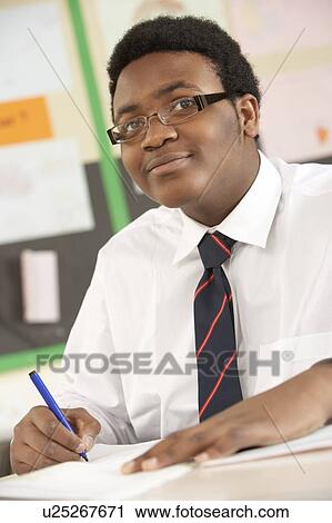 Male Teenage Student Studying In Classroom View Large Photo Image Stock Image - Male Teenage Student Studying In Classroom. Fotosearch