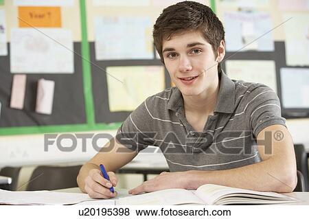 Male Teenage Student Studying In Classroom View Large Photo Image Stock Photo - Male Teenage Student Studying In Classroom. Fotosearch