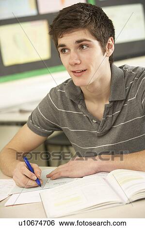 Male Teenage Student Studying In Classroom View Large Photo Image Stock Photograph - Male Teenage Student Studying In Classroom. Fotosearch