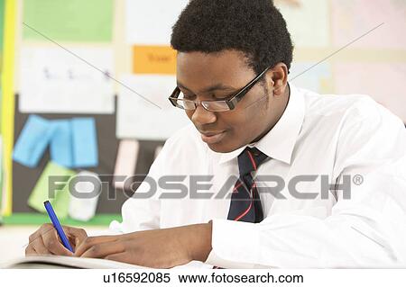 Male Teenage Student Studying In Classroom View Large Photo Image Stock Photography - Male Teenage Student Studying In Classroom. Fotosearch