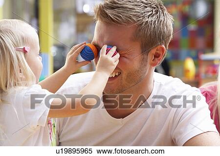 Man with children playing together View Large Photo Image Stock Photography - Man with children playing together. Fotosearch