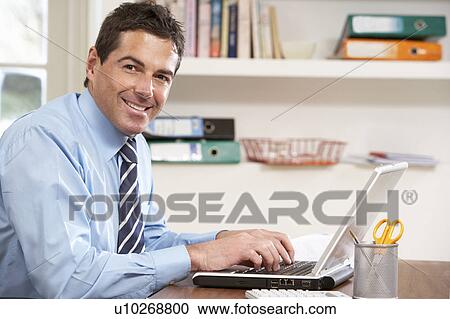 Man Working From Home Using Laptop View Large Photo Image Stock Image - Man Working From Home Using Laptop. Fotosearch