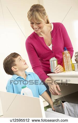 Mother And Son Recyling Waste At Home View Large Photo Image Stock Image - Mother And Son Recyling Waste At Home. Fotosearch