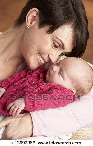 Portrait Of Mother With Newborn Baby At Home View Large Photo Image Stock Photograph - Portrait Of Mother With Newborn Baby At Home. Fotosearch
