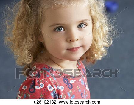 Stock Image - Portrait of pretty girl. Fotosearch