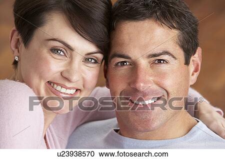 Stock Image - Portrait Of Romantic Young Couple. Fotosearch
