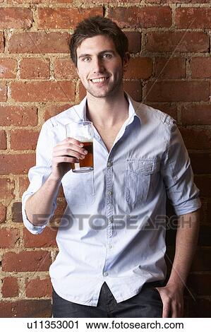 Stock Image - Portrait of young man. Fotosearch