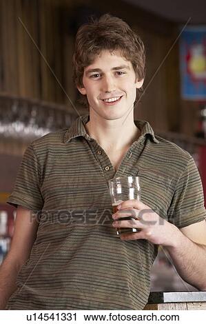 Stock Image - Portrait of young man. Fotosearch