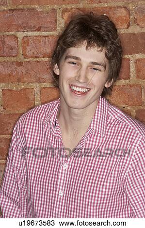 Portrait of young man View Large Photo Image Stock Image - Portrait of young man. Fotosearch