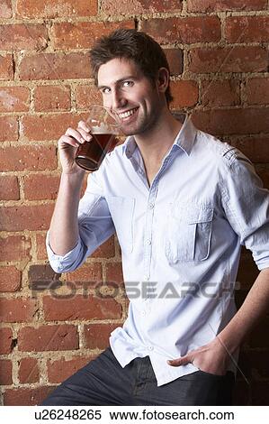Stock Photography - Portrait of young man. Fotosearch