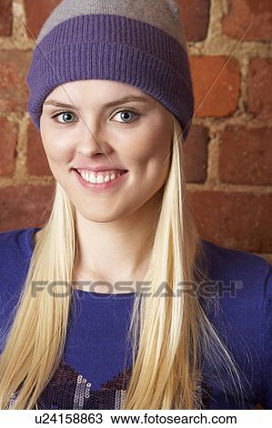 Stock Image - Portrait of young woman. Fotosearch