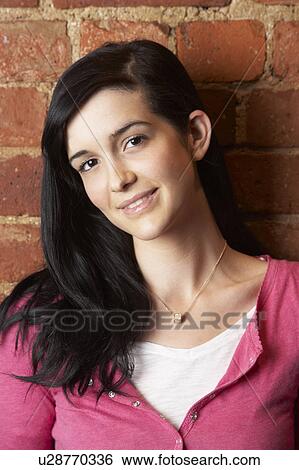 Stock Photograph - Portrait of young woman. Fotosearch