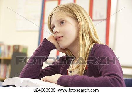 Schoolgirl Studying In Classroom View Large Photo Image Stock Image - Schoolgirl Studying In Classroom. Fotosearch