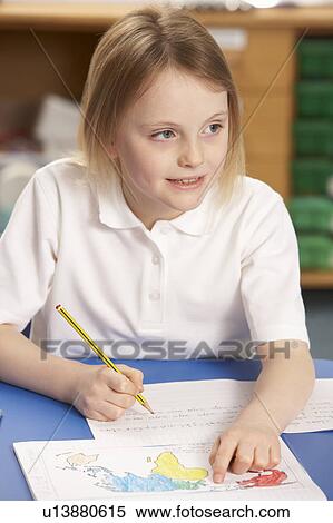 Schoolgirl Studying In Classroom View Large Photo Image Stock Photography - Schoolgirl Studying In Classroom. Fotosearch