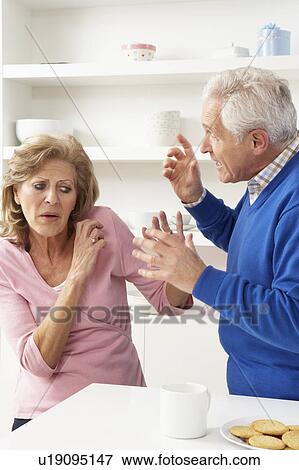 Senior Couple Having Argument At Home View Large Photo Image Stock Photo - Senior Couple Having Argument At Home. Fotosearch