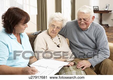 Senior Couple In Discussion With Health Visitor At Home View Large Photo Image Stock Image - Senior Couple In Discussion With Health Visitor At Home. Fotosearch