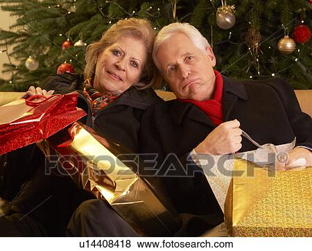 Senior Couple Returning After Christmas Shopping Trip View Large Photo Image Stock Photo - Senior Couple Returning After Christmas Shopping Trip. Fotosearch