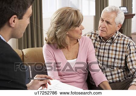 Senior Couple Talking With Financial Advisor View Large Photo Image Stock Photograph - Senior Couple Talking With Financial Advisor. Fotosearch
