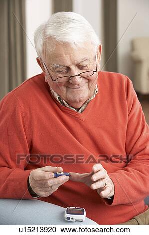 Senior Man Checking Blood Sugar Level At Home View Large Photo Image Stock Image - Senior Man Checking Blood Sugar Level At Home. Fotosearch