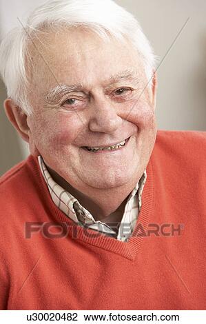 Senior Man Relaxing In Chair At Home View Large Photo Image Stock Image - Senior Man Relaxing In Chair At Home. Fotosearch