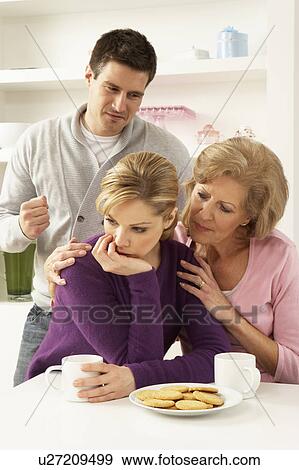 Senior Mother Interferring With Couple Having Argument At Home View Large Photo Image Stock Photo - Senior Mother Interferring With Couple Having Argument At Home. Fotosearch