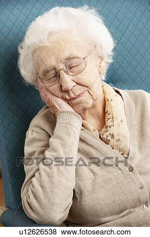 Senior Woman Resting In Chair At Home View Large Photo Image Stock Photo - Senior Woman Resting In Chair At Home. Fotosearch